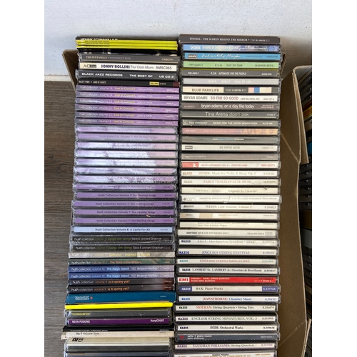 741 - Two boxes containing CDs by a variety of artists and bands to include The Prodigy, Oasis, Blur, R.E.... 