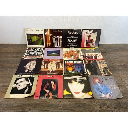 748 - A collection of vinyl records and CDs by a variety of artists and bands to include The Cure, U2, Dir... 