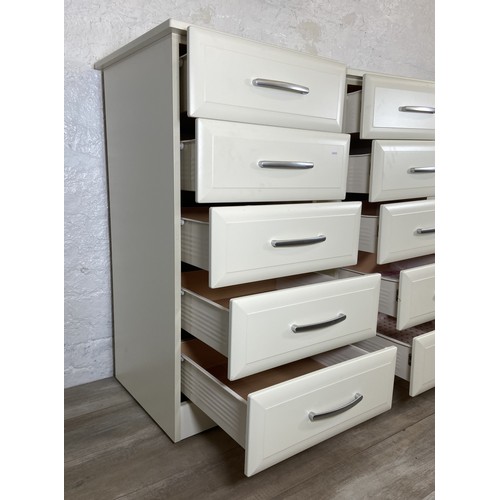 111 - A pair of modern white laminate chests of drawers - approx. 106cm high x 54cm wide x 50cm deep