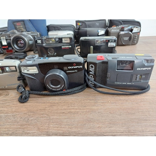 668 - A collection of Olympus cameras to include AF-10 Mini, Trip XB3 Big Finder, Superzoom 700BF, Trip AF... 