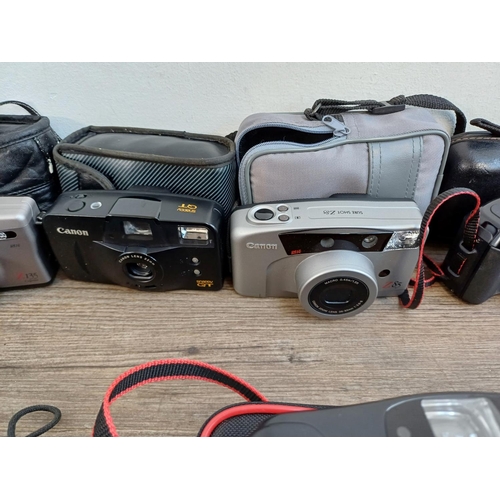 669 - A collection of Canon cameras to include Sure Shot 70 Zoom, Max, AF-7, Supreme, Multi Tele, Z85, Z13... 