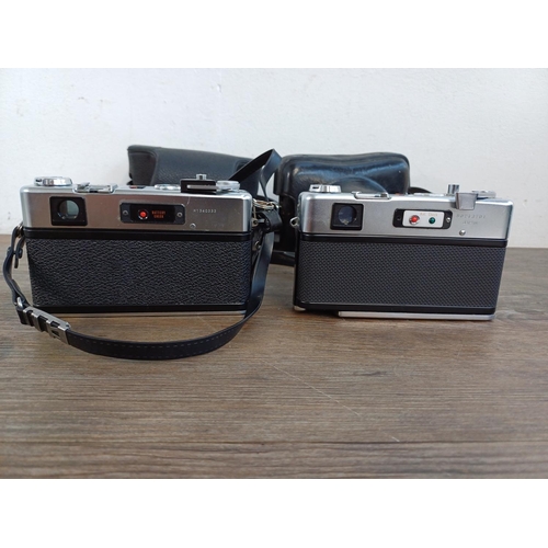 674 - Two cased Yashica 35mm rangefinder cameras, one 1970s Electro 35 GSN with instruction manual and one... 