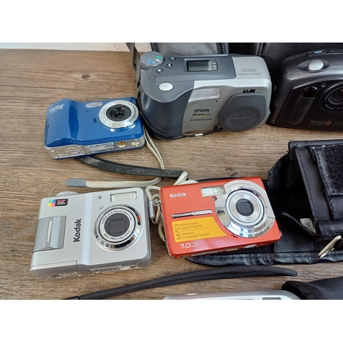 676 - A collection of compact digital cameras to include Toshiba PDR-5 with accessories, Kodak EasyShare M... 