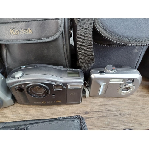 676 - A collection of compact digital cameras to include Toshiba PDR-5 with accessories, Kodak EasyShare M... 