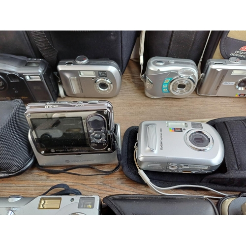 676 - A collection of compact digital cameras to include Toshiba PDR-5 with accessories, Kodak EasyShare M... 