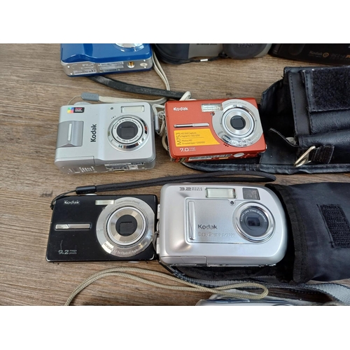 676 - A collection of compact digital cameras to include Toshiba PDR-5 with accessories, Kodak EasyShare M... 