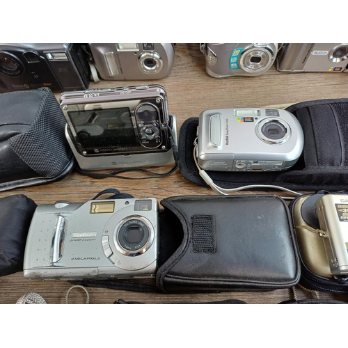 676 - A collection of compact digital cameras to include Toshiba PDR-5 with accessories, Kodak EasyShare M... 