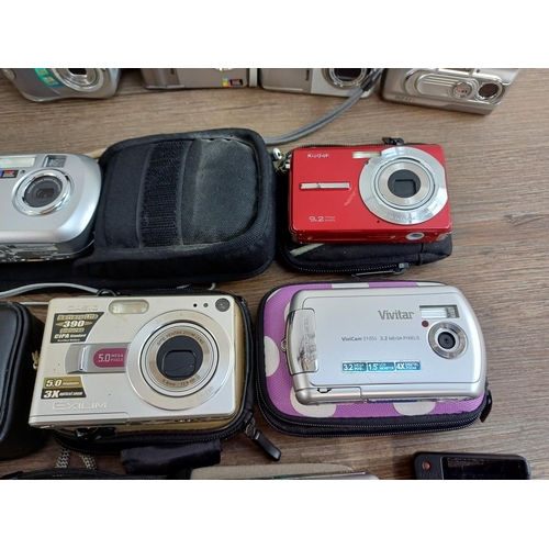 676 - A collection of compact digital cameras to include Toshiba PDR-5 with accessories, Kodak EasyShare M... 