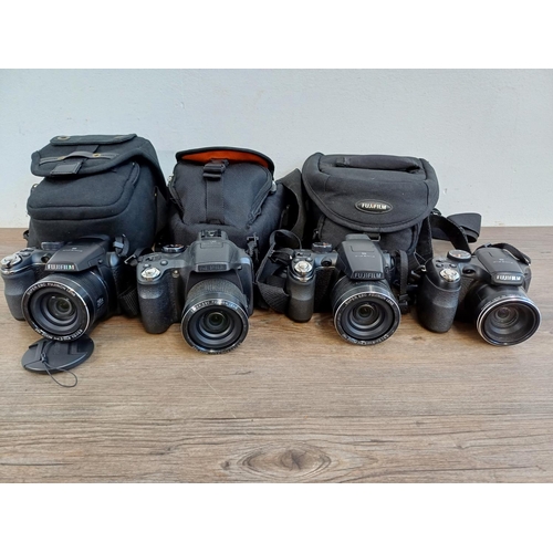 678 - Four Fujifilm FinePix 14mp digital bridge cameras, one SL245, one S2950 and two S4300