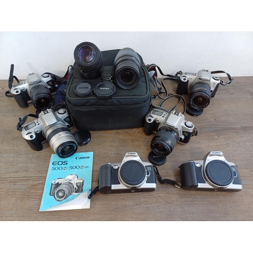 680 - Six Canon EOS 35mm SLR cameras, one cased 500N with two Sigma lenses, two 500N bodies, two 500N fitt... 