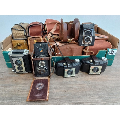 681 - A collection of box cameras and pseudo TLRs to include Voigtländer Brilliant, Ross Ensign Ful-Vue Su... 