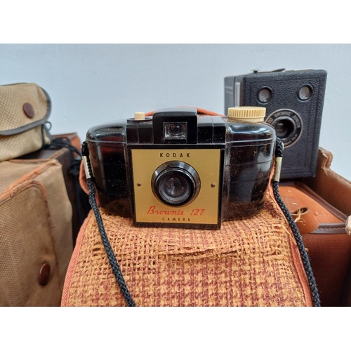 682 - A collection of box cameras and pseudo TLRs to include Voigtländer Brilliant, Kodak 'Hawkeye' Ace De... 