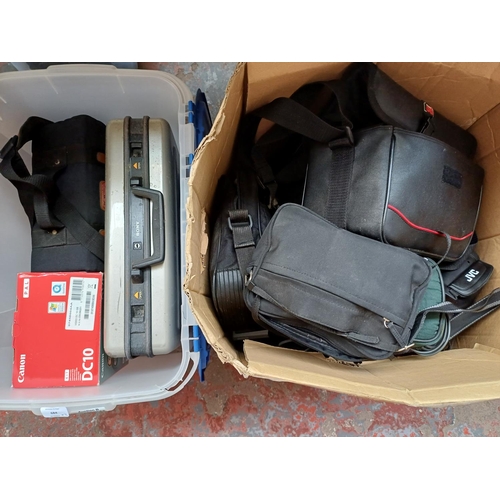 684 - Two boxes containing a collection of camcorders to include boxed Canon DC10 DVD R/RW etc.