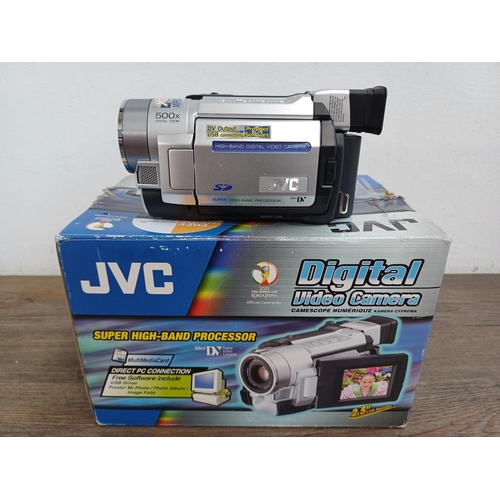 686 - Two boxes containing camcorders to include boxed JVC GR-DVL365EK Mini DV with accessories etc.