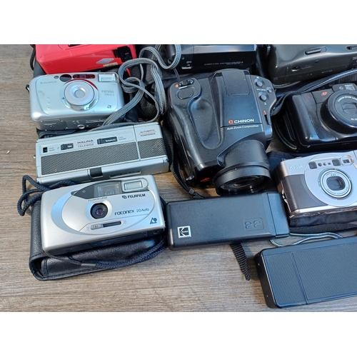 688 - A collection of cameras to include Haking Halina PIX for 110 film, Samsung AF Zoom 105S 35mm, Ricoh ... 