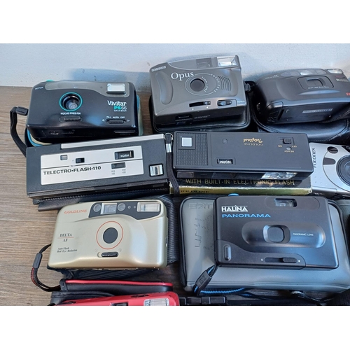 688 - A collection of cameras to include Haking Halina PIX for 110 film, Samsung AF Zoom 105S 35mm, Ricoh ... 