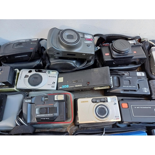 688 - A collection of cameras to include Haking Halina PIX for 110 film, Samsung AF Zoom 105S 35mm, Ricoh ... 