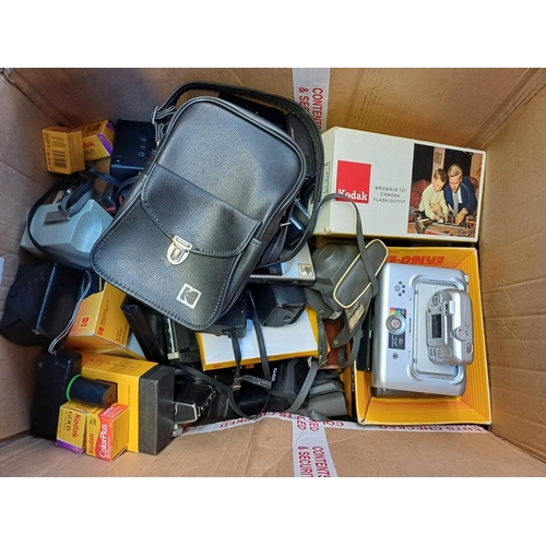 691 - A box containing Kodak cameras