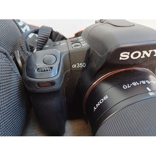 697 - Two Sony Alpha α DSLR cameras fitted with DT 3.5-5.6/18-70 macro lenses, one A350 14.2mp and one cas... 