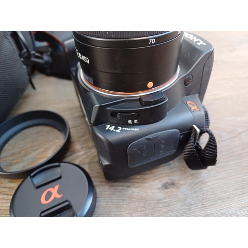 697 - Two Sony Alpha α DSLR cameras fitted with DT 3.5-5.6/18-70 macro lenses, one A350 14.2mp and one cas... 