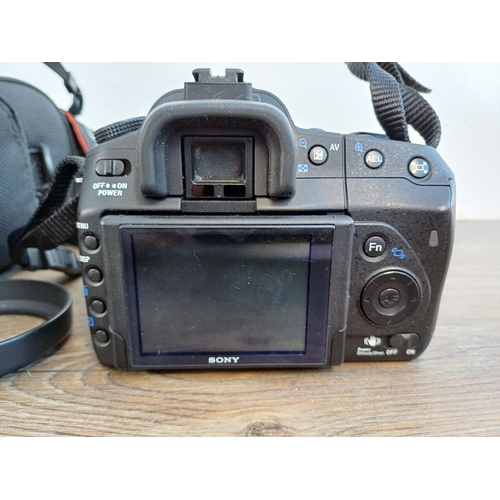 697 - Two Sony Alpha α DSLR cameras fitted with DT 3.5-5.6/18-70 macro lenses, one A350 14.2mp and one cas... 