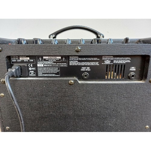 725 - Two items, one Vox Valvetronix AD15VT two-channel modelling guitar amplifier with built in effects a... 