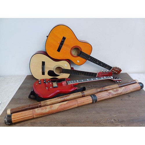 726 - Five items, one Hi Spot child's nylon-strung classical guitar, one rainstick, one didgeridoo, one Re... 