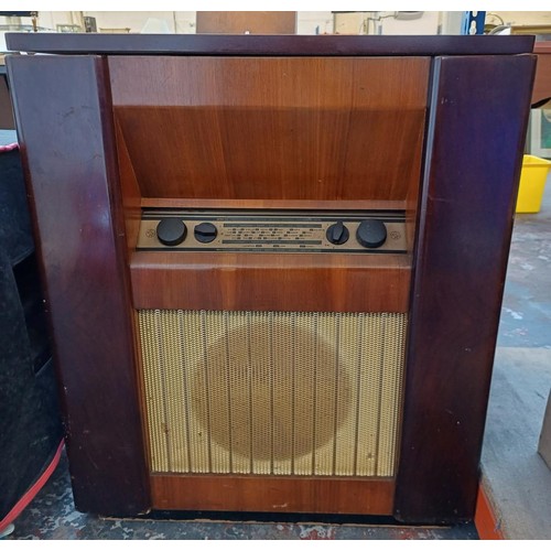 728 - A late 1950s Invicta Radio Ltd. 59RG seven-valve floor-standing radiogram comprising BSR Monarch thr... 