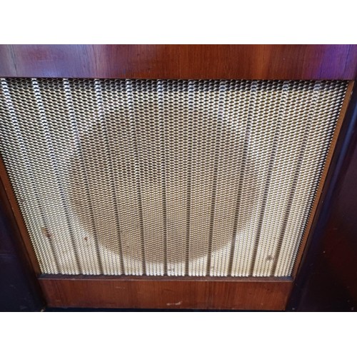 728 - A late 1950s Invicta Radio Ltd. 59RG seven-valve floor-standing radiogram comprising BSR Monarch thr... 