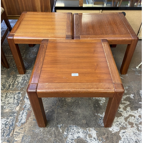 135 - Three mid 20th century Danish teak side tables - approx. 40cm high x 50cm wide x 50cm deep