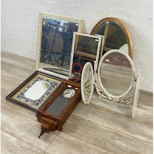 194 - Six items, one Highlands oak cased chiming wall clock with pendulum and key and five various mirrors