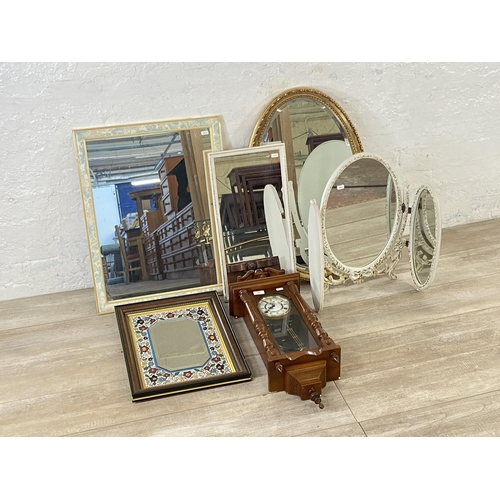 194 - Six items, one Highlands oak cased chiming wall clock with pendulum and key and five various mirrors