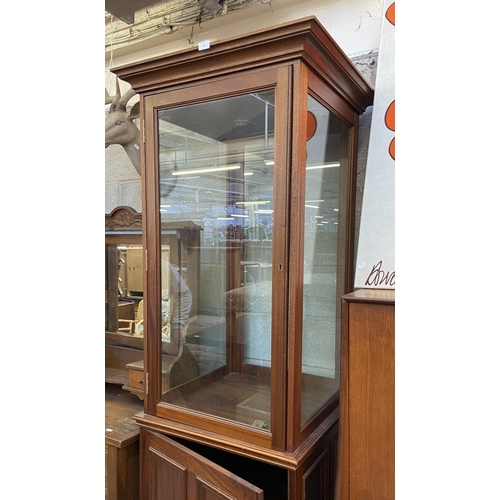 20 - A mahogany display cabinet - approx. 210cm high x 73cm wide x 70cm deep