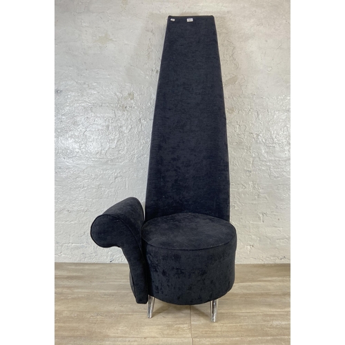 232 - A modern black fabric upholstered high back chair