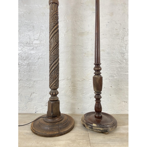 233A - Two standard lamps, one mahogany and one carved beech - largest approx. 156cm high