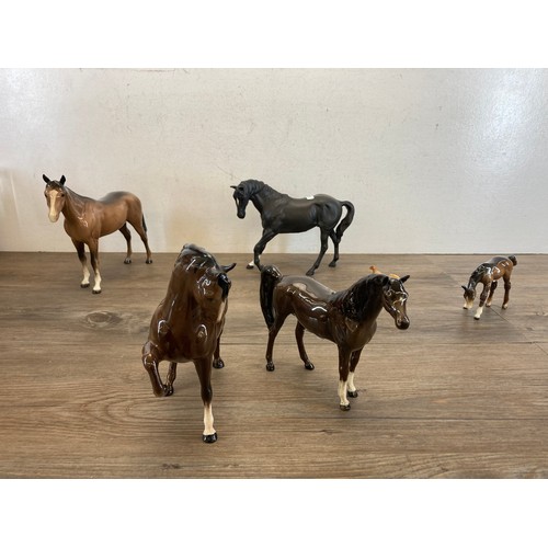 383 - Nine ceramic horse figurines to include five Beswick, one Royal Doulton etc.