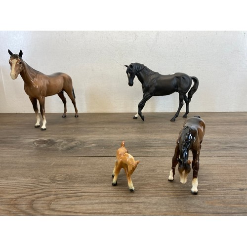 383 - Nine ceramic horse figurines to include five Beswick, one Royal Doulton etc.