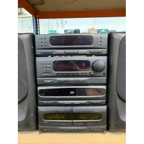 759 - A Kenwood hi-fi system comprising T-322L three-band tuner, A-322 graphic equaliser amplifier, DP-322... 