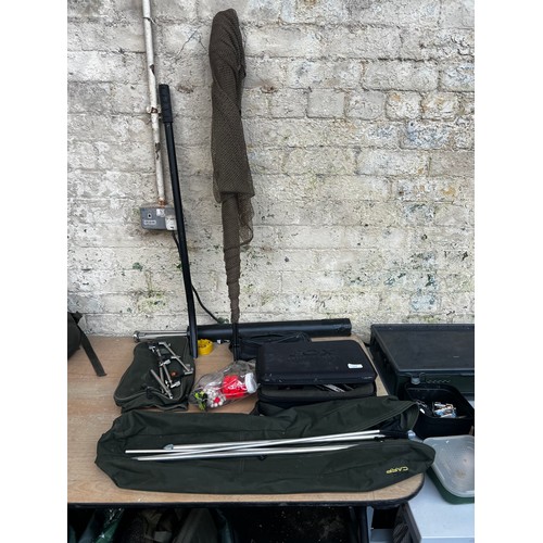 1004 - A collection of fishing items to include Fox Micron bite alarms, rod rests, landing net etc.