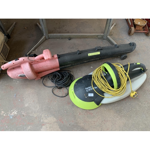 1047 - Two electric power tools, one Green Blade leaf blower and one Garden Groom Pro hedge trimmer