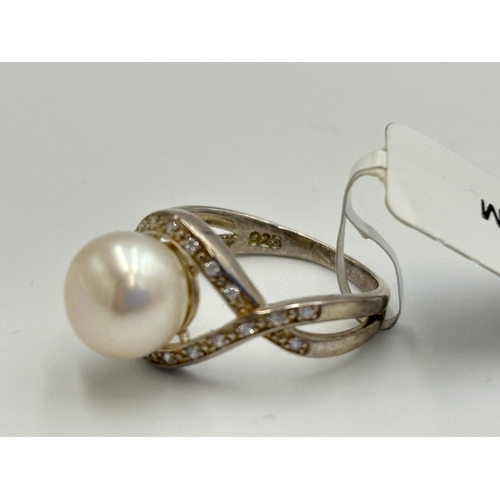 2168 - Two .925 silver CZ and pearl dress rings, one size M and one size N - approx. gross weight 7.2g