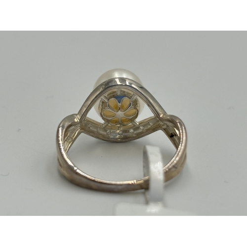 2168 - Two .925 silver CZ and pearl dress rings, one size M and one size N - approx. gross weight 7.2g