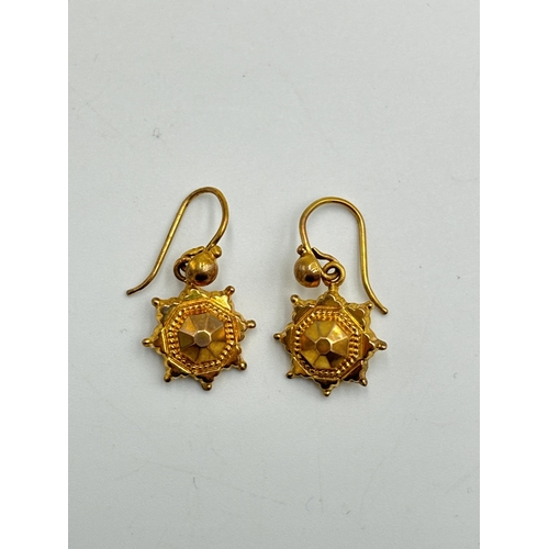 2180 - A pair of late 19th/early 20th century 9ct gold hook earrings - approx. gross weight 0.97g