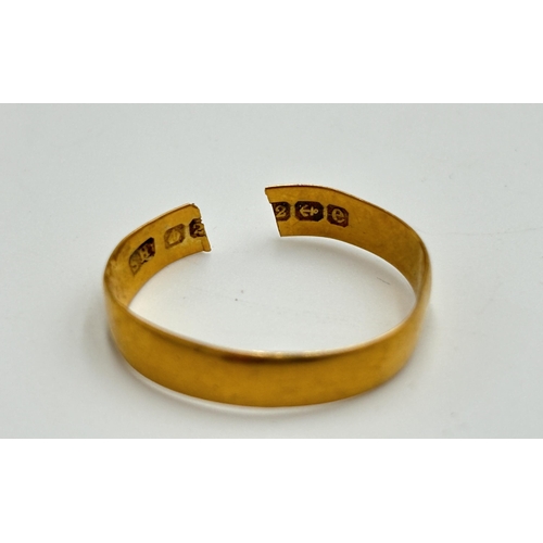 2184 - A hallmarked Birmingham 22ct gold wedding band - approx. gross weight 1.3g