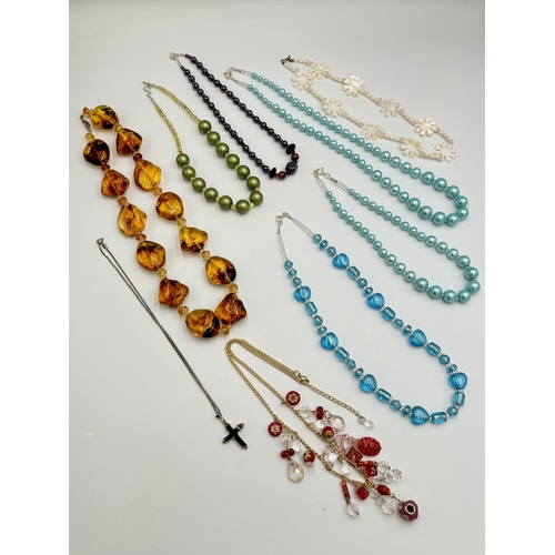 2188 - Nine necklaces, eight .925 silver and one amber effect