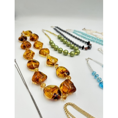 2188 - Nine necklaces, eight .925 silver and one amber effect