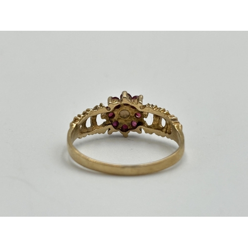 2189 - A hallmarked London 9ct gold ruby and opal ring with textured shoulders, size O - approx. gross weig... 