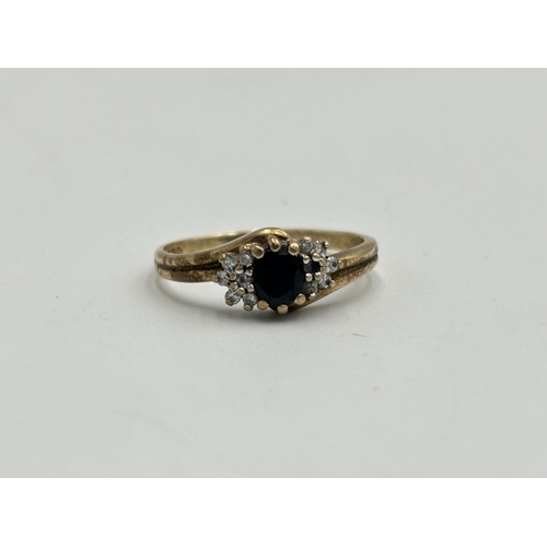 2190 - A hallmarked 9ct gold sapphire and CZ ring, size Q - approx. gross weight 2g