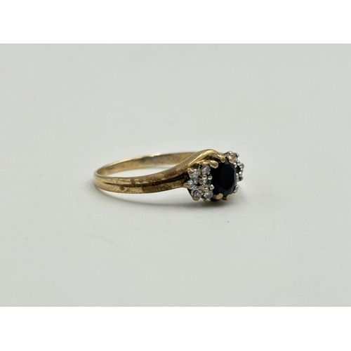 2190 - A hallmarked 9ct gold sapphire and CZ ring, size Q - approx. gross weight 2g