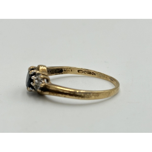 2190 - A hallmarked 9ct gold sapphire and CZ ring, size Q - approx. gross weight 2g